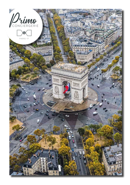 Vue aérienne du 17ème arrondissement de Paris, mettant en valeur les immeubles haussmanniens, les larges avenues et les espaces verts. L'Arc de Triomphe est au centre de la photo, symbole de la gloire militaire française, situé au centre de la place Charles-de-Gaulle.
